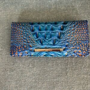 Brahmin Ady wallet. 7.5x3.75x1 inches. Gorgeous blue and teal and copper.